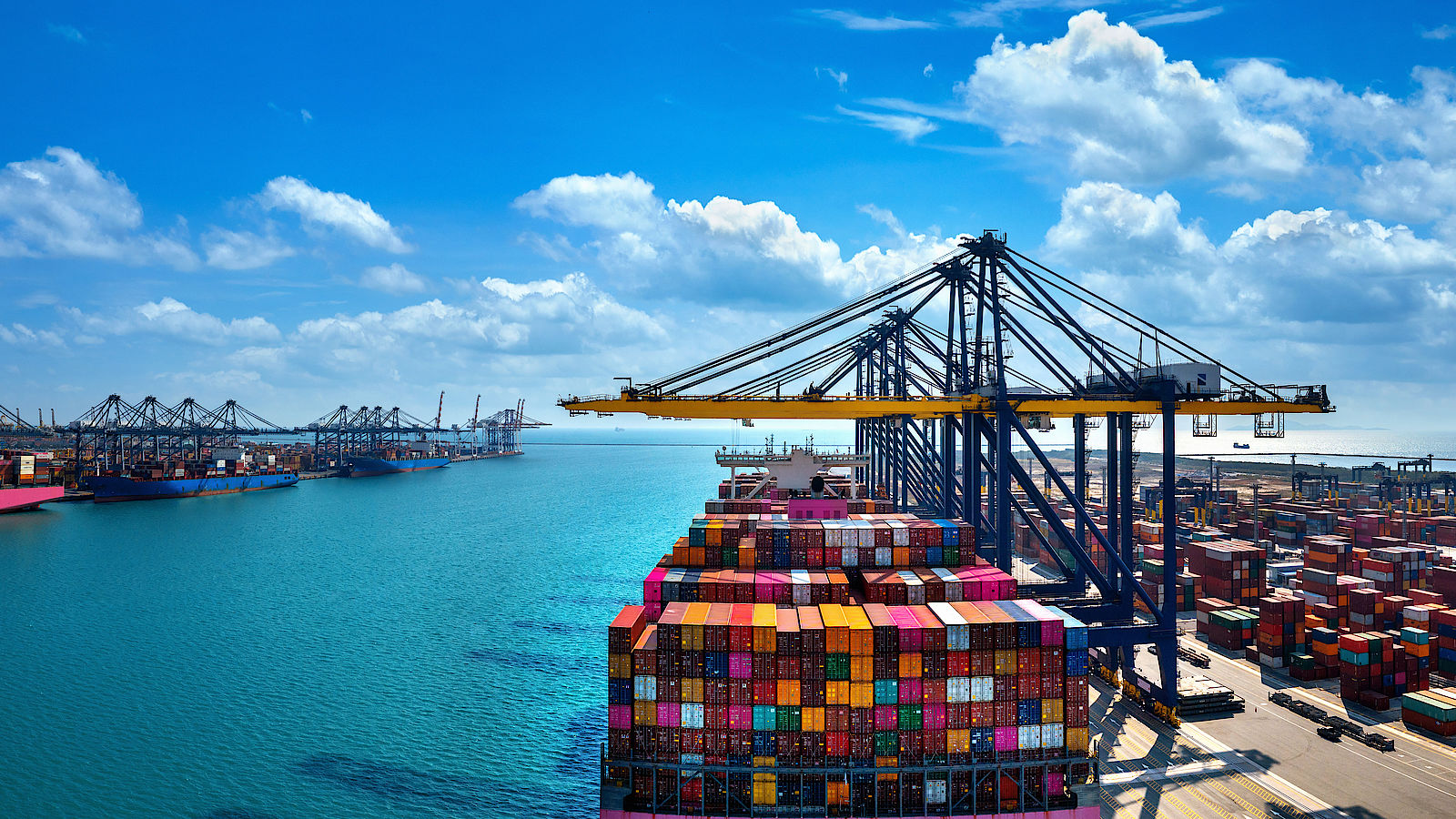 Container vessel moving cargo across global trade routes